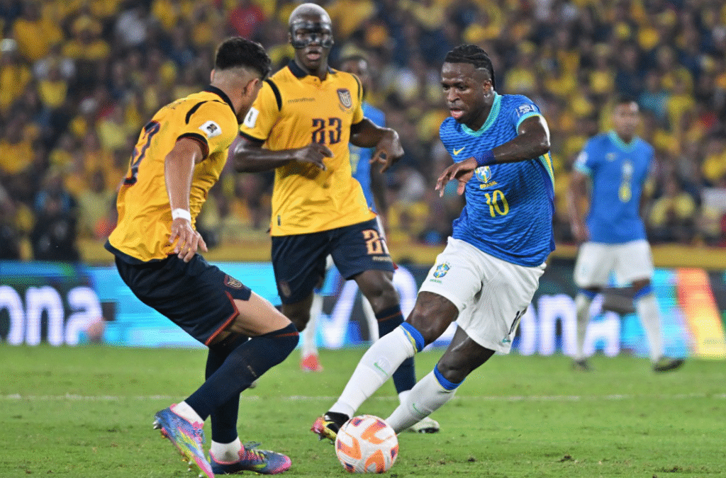 Brazil's forward #20 Estevao and Ecuador's defender #07 Pervis Estupinan fight for the ball during the 2026 FIFA World Cup South American qualifiers football match between Ecuador and Brazil at the Monumental Banco Pichincha stadium in Guayaquil, province of Guayas,